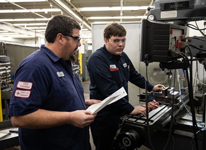 Two men working together