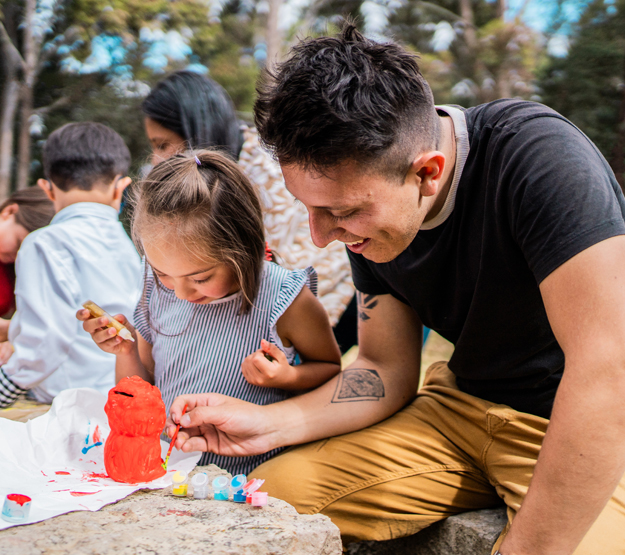 Man and child painting 