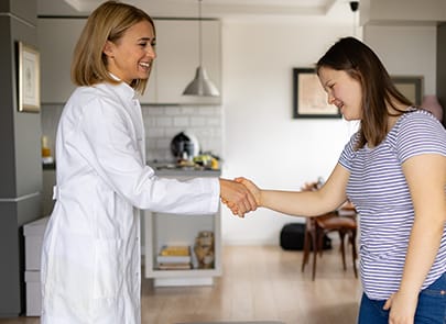 Doctor and patient shaking hands 