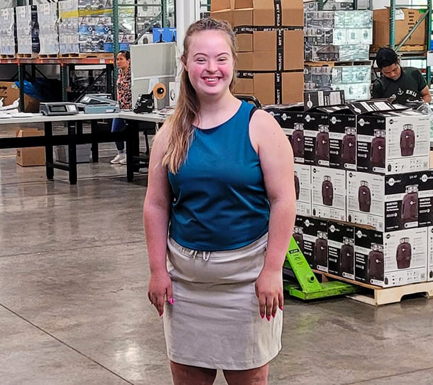 Photo of woman in warehouse 