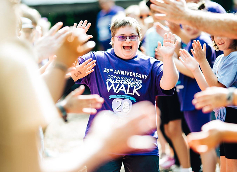 Photo of a participant running in an awareness walk 