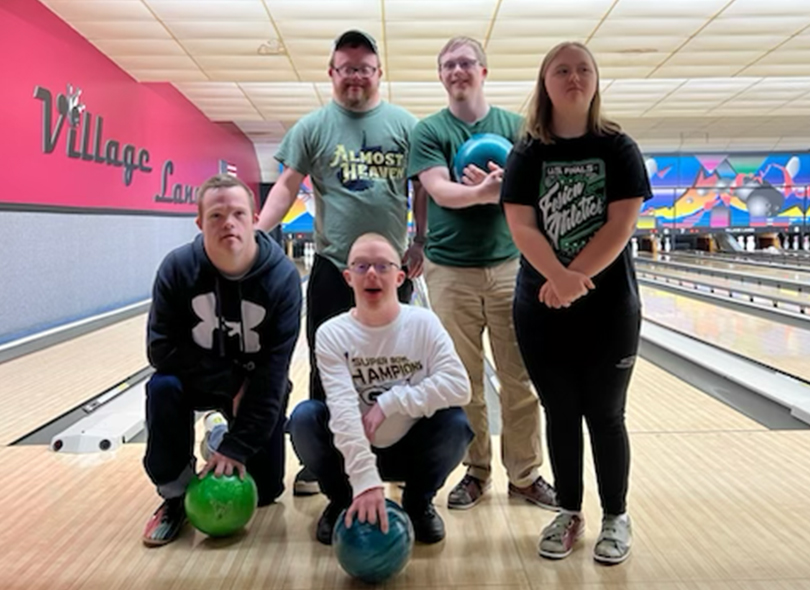 Group bowling together 