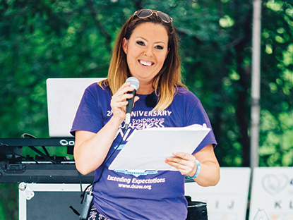 Woman speaking into microphone