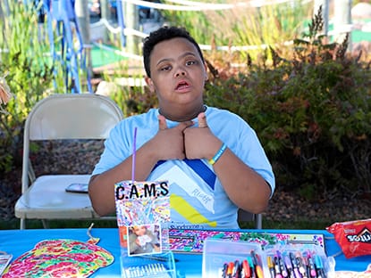 Boy giving thumbs up